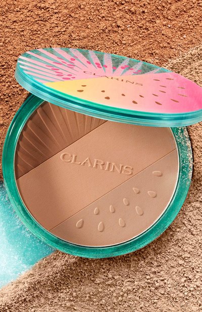 Коллекционная бронзирующая пудра bronzing compact (18g) CLARINS бесцветного цвета по цене 3850 руб., арт. 80076368, фото 3 Коллекционная бронзирующая пудра bronzing compact (18g) CLARINS, арт. 80076368, фото 3