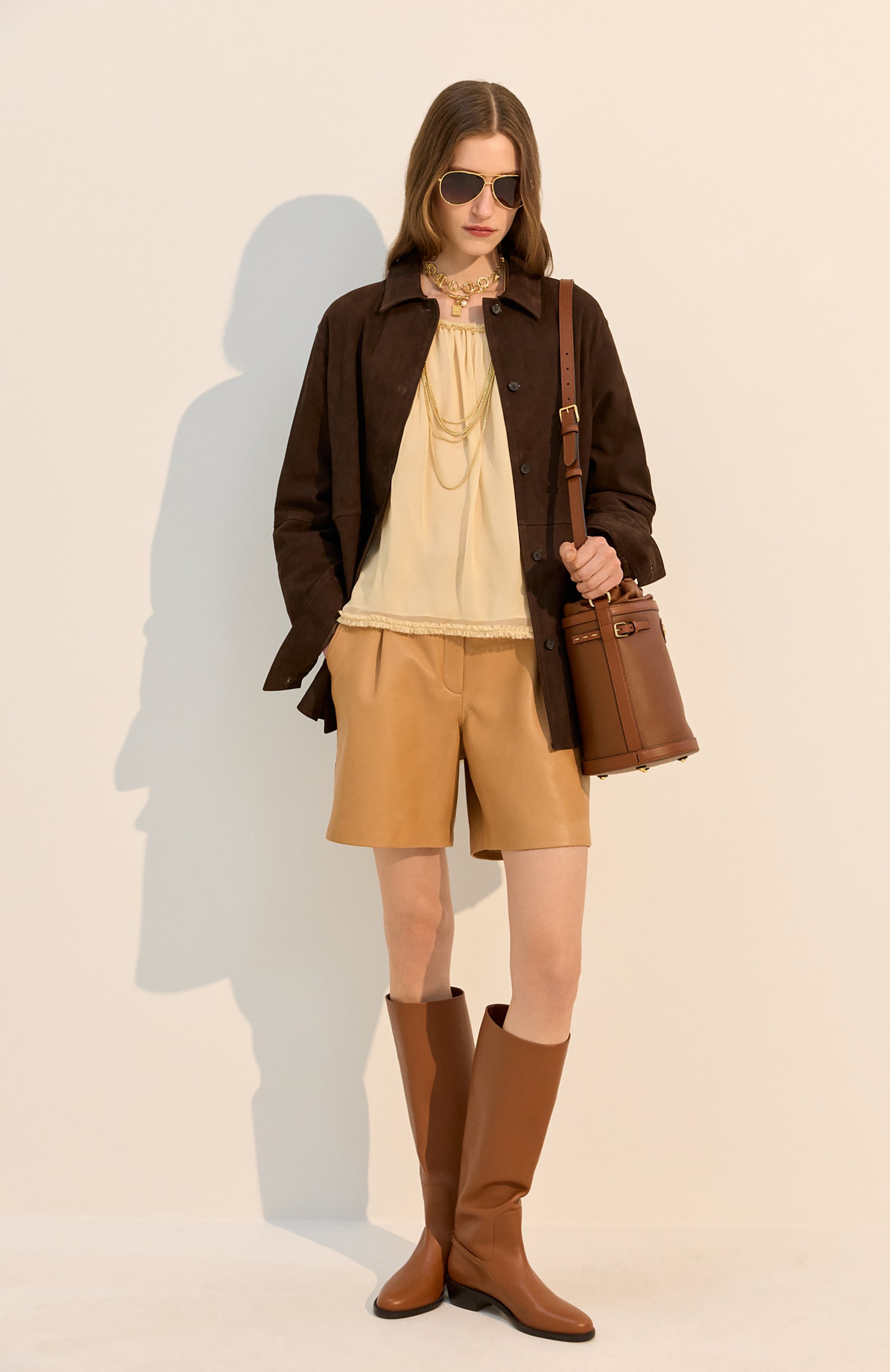 Кожаные сапоги FERRAGAMO коричневого цвета по цене 225000 руб., арт. 01K226/784902, фото 7 Кожаные сапоги FERRAGAMO, арт. 01K226/784902, фото 7