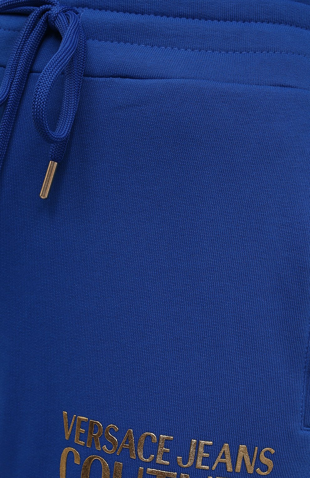 Хлопковые джоггеры VERSACE JEANS COUTURE синего цвета по цене 19300 руб., арт. 71HAAT04-71DP310 L0G0 F0IL S C0TT0N/CF00T, фото 5 Хлопковые джоггеры VERSACE JEANS COUTURE, арт. 71HAAT04-71DP310 L0G0 F0IL S C0TT0N/CF00T, фото 5
