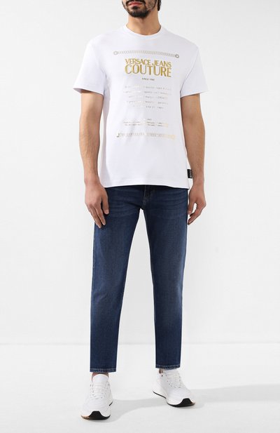 Джинсы VERSACE JEANS COUTURE синего цвета по цене 17300 руб., арт. A2GUA0SN-UUP500 RIC.VJC 19/60511, фото 2 Джинсы VERSACE JEANS COUTURE, арт. A2GUA0SN-UUP500 RIC.VJC 19/60511, фото 2
