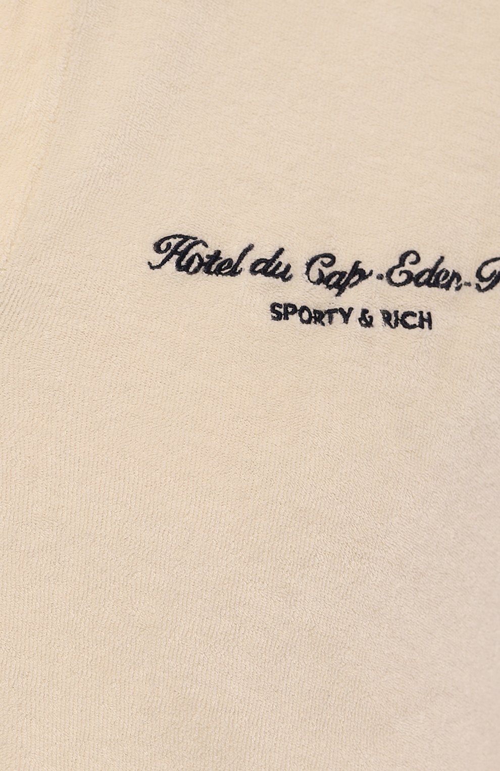Хлопковое поло sporty & rich х hotel du cap-eden-roc SPORTY AND RICH кремового цвета по цене 19850 руб., арт. T0032501651CR01, фото 5 Хлопковое поло sporty & rich х hotel du cap-eden-roc SPORTY AND RICH, арт. T0032501651CR01, фото 5
