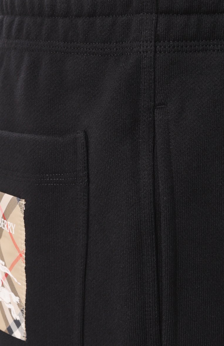 Мужские хлопковые джоггеры BURBERRY черного цвета, арт. 8102278 | Фото 6 (Длина (брюки, джинсы): Стандартные; Драгоценные камни: Проставлено; Материал сплава: Проставлено; Силуэт М (брюки): Джоггеры; Стили: Спорт-шик; Материал внешний: Хлопок)