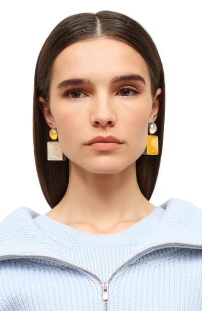 Клипсы orbita SWAROVSKI желтого цвета по цене 24750 руб., арт. 5600522, фото 2 Клипсы orbita SWAROVSKI, арт. 5600522, фото 2