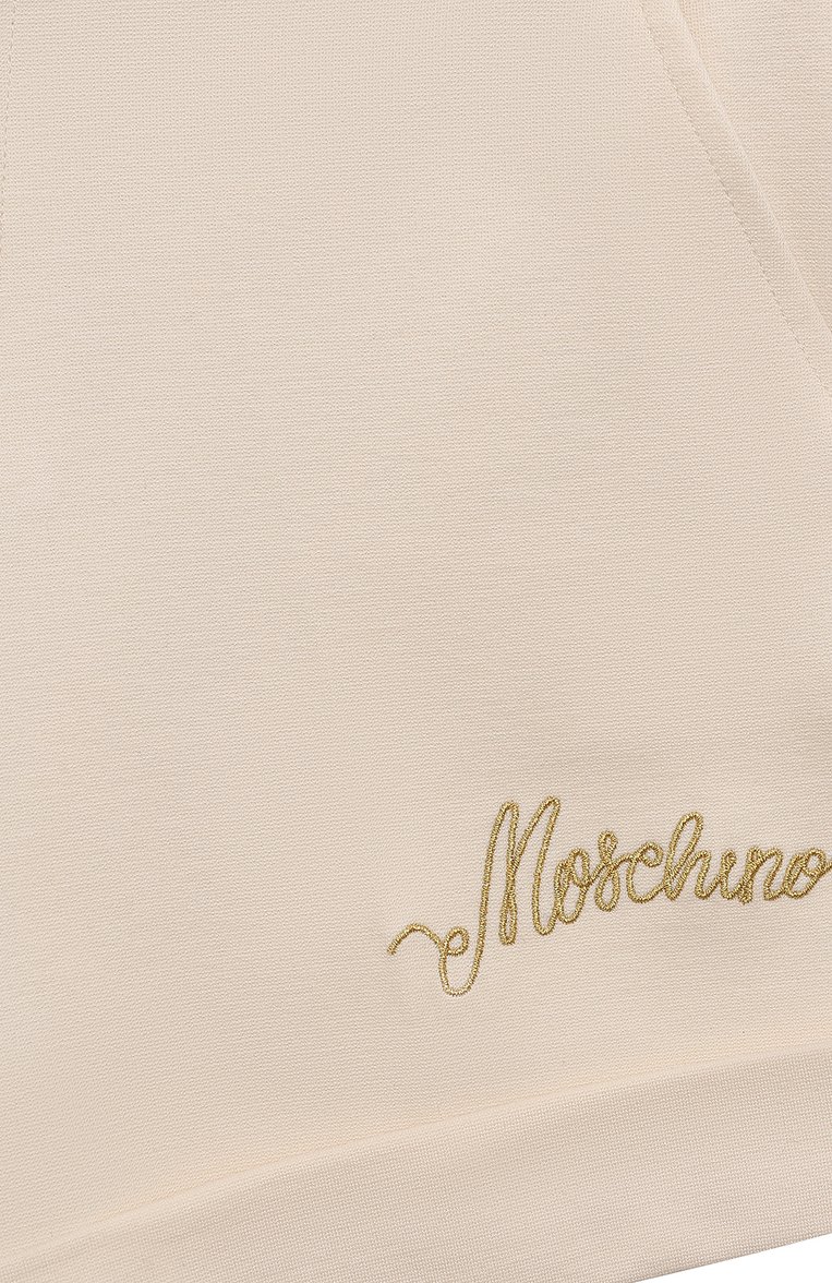 Детские шорты из вискозы MOSCHINO кремового цвета, арт. HDQ011/LJA07/10A-14A | Фото 3 (Нос: Не проставлено; Материал внешний: Вискоза; Случай: Повседневный; Автоматизация состава: Проставлено)