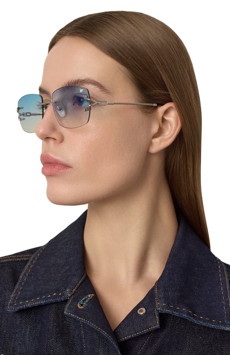 Женские солнцезащитные очки VINTAGE FRAMES голубого цвета, арт. BAL HARB0UR WHITE G0LD/BLUE FLASH | Фото 2 (Региональные ограничения белый список (Axapta Mercury): Не проставлено; Нос: Не проставлено; Тип очков: С/з; Кросс-КТ: С/з-унисекс; Материал: Металл; Очки форма: Прямоугольные, Безоправные; Оптика Гендер: оптика-унисекс)