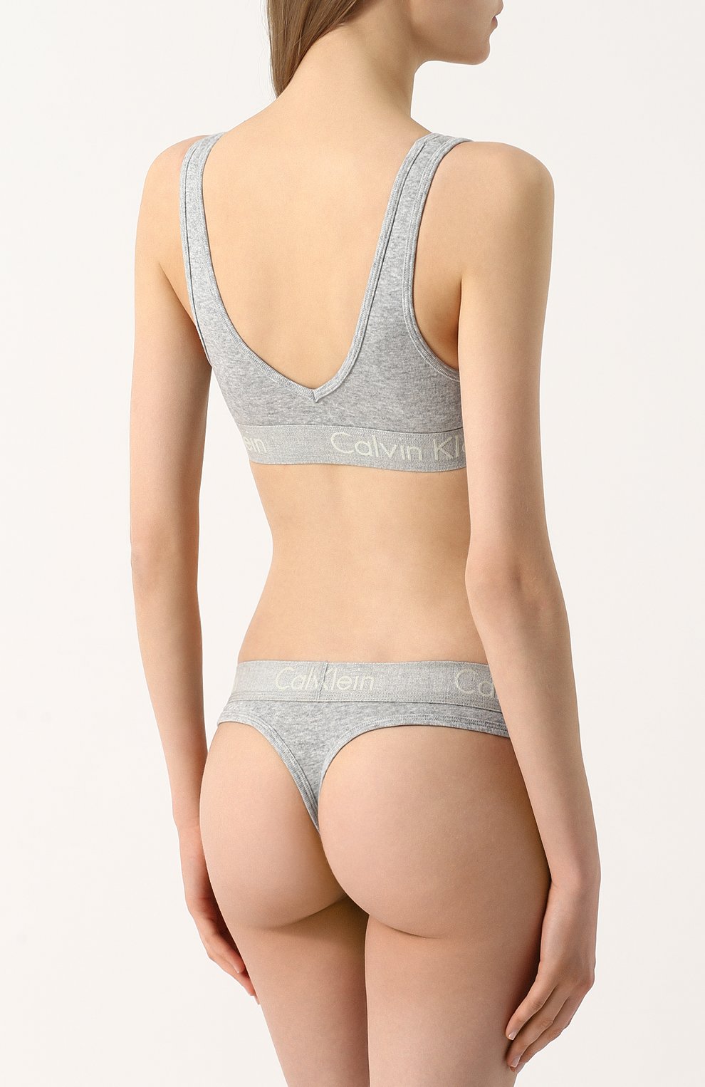 Хлопковые трусы-стринги с логотипом бренда CALVIN KLEIN серого цвета по цене 2380 руб., арт. QF4509E, фото 3 Хлопковые трусы-стринги с логотипом бренда CALVIN KLEIN, арт. QF4509E, фото 3