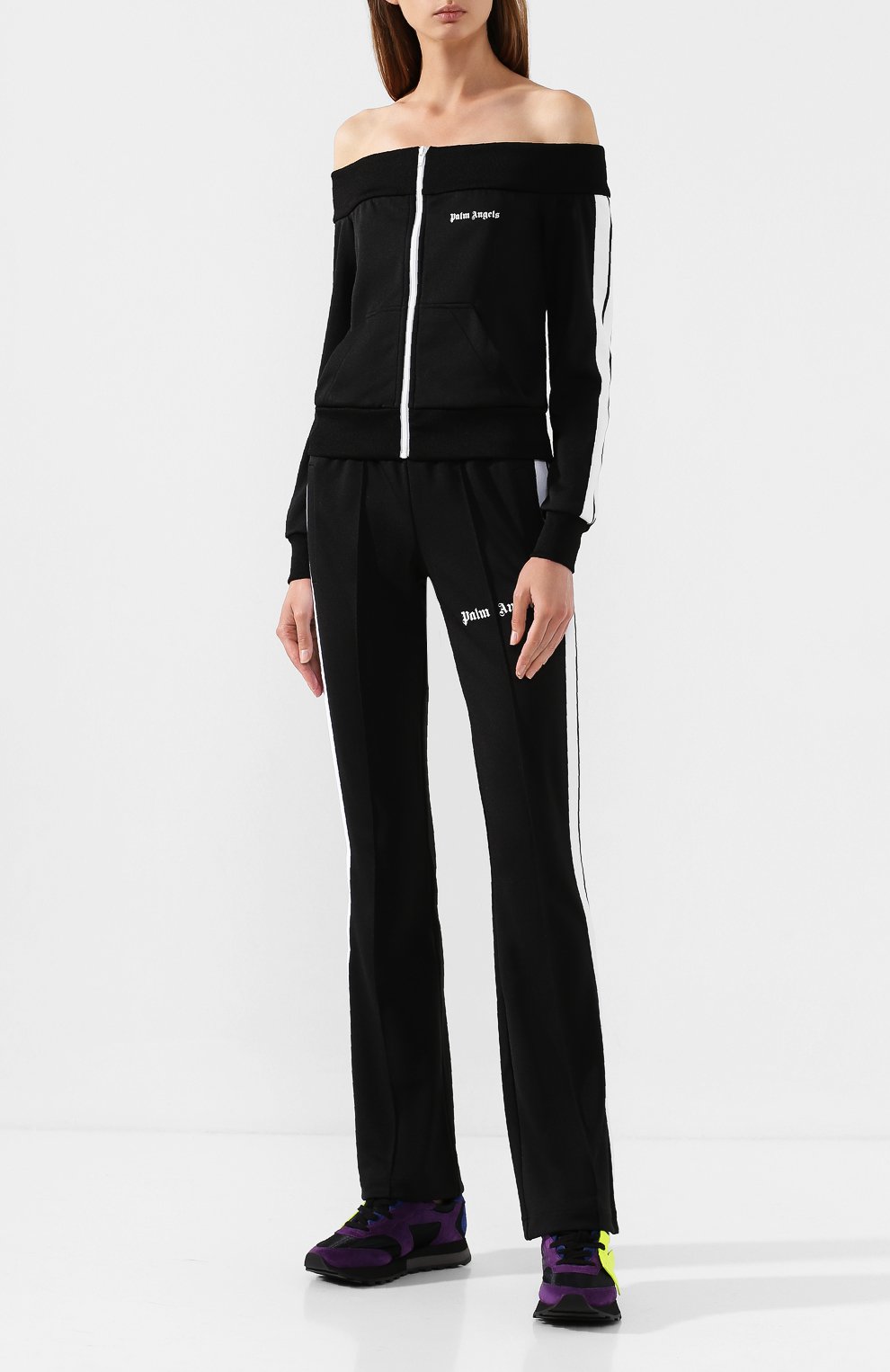 Брюки с лампасами PALM ANGELS черно-белого цвета по цене 36050 руб., арт. PWCA007E193840021001, фото 2 Брюки с лампасами PALM ANGELS, арт. PWCA007E193840021001, фото 2