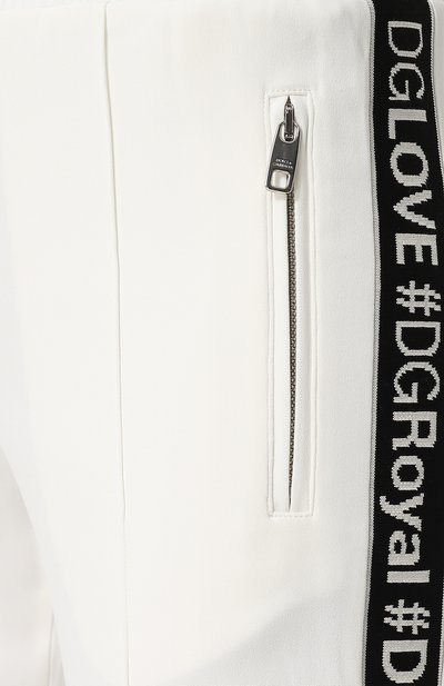 Укороченные брюки с контрастными лампасами DOLCE & GABBANA белого цвета по цене 79950 руб., арт. FTA66T/G70MP, фото 5 Укороченные брюки с контрастными лампасами DOLCE & GABBANA, арт. FTA66T/G70MP, фото 5