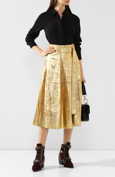 Кожаная юбка GOLDEN GOOSE DELUXE BRAND золотого цвета по цене 130500 руб., арт. G35WP012.P3, фото 2 Кожаная юбка GOLDEN GOOSE DELUXE BRAND, арт. G35WP012.P3, фото 2
