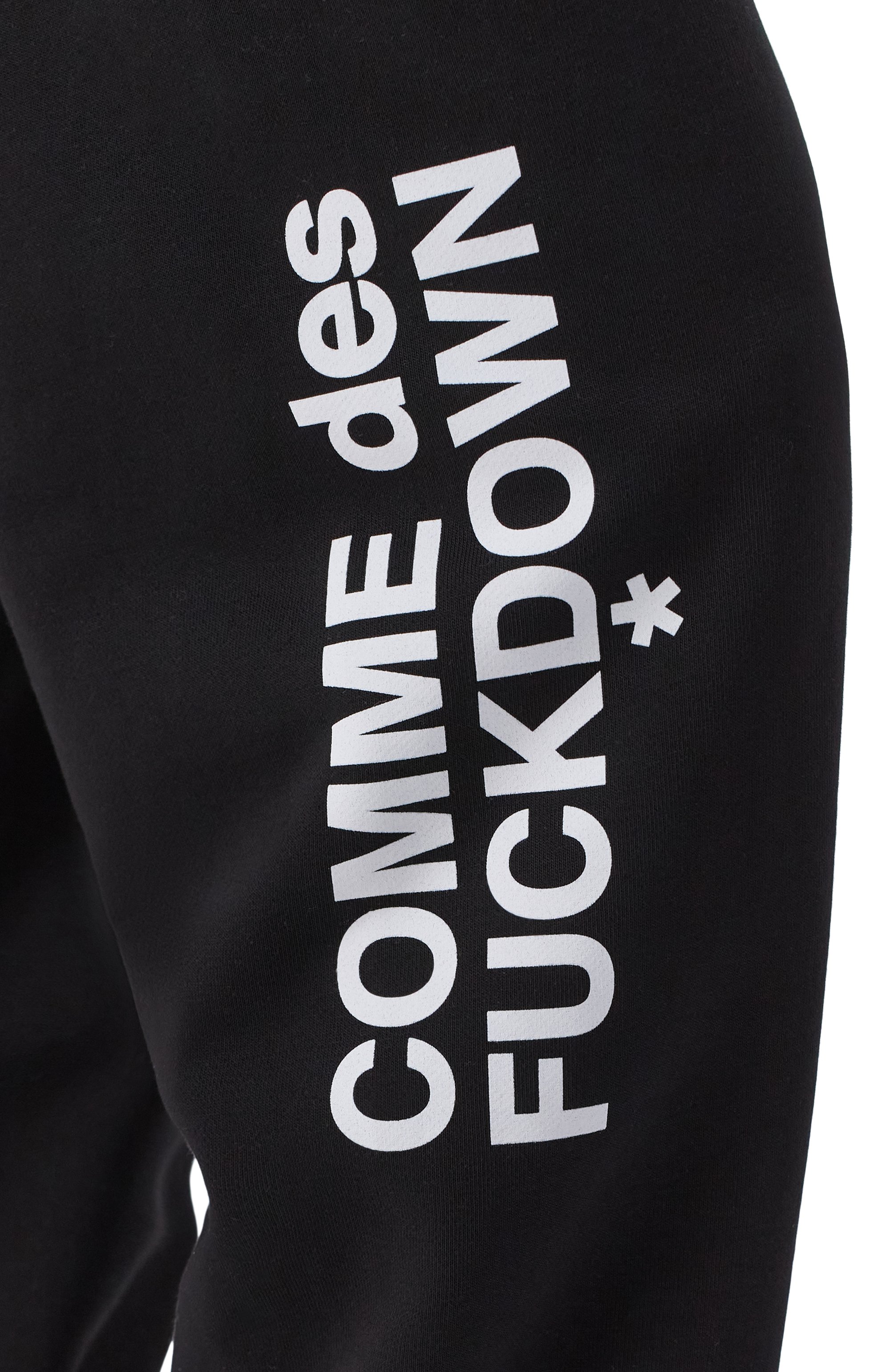 Хлопковые джоггеры COMME DES FUCKDOWN черного цвета по цене 13500 руб., арт. CFABW01557, фото 5 Хлопковые джоггеры COMME DES FUCKDOWN, арт. CFABW01557, фото 5