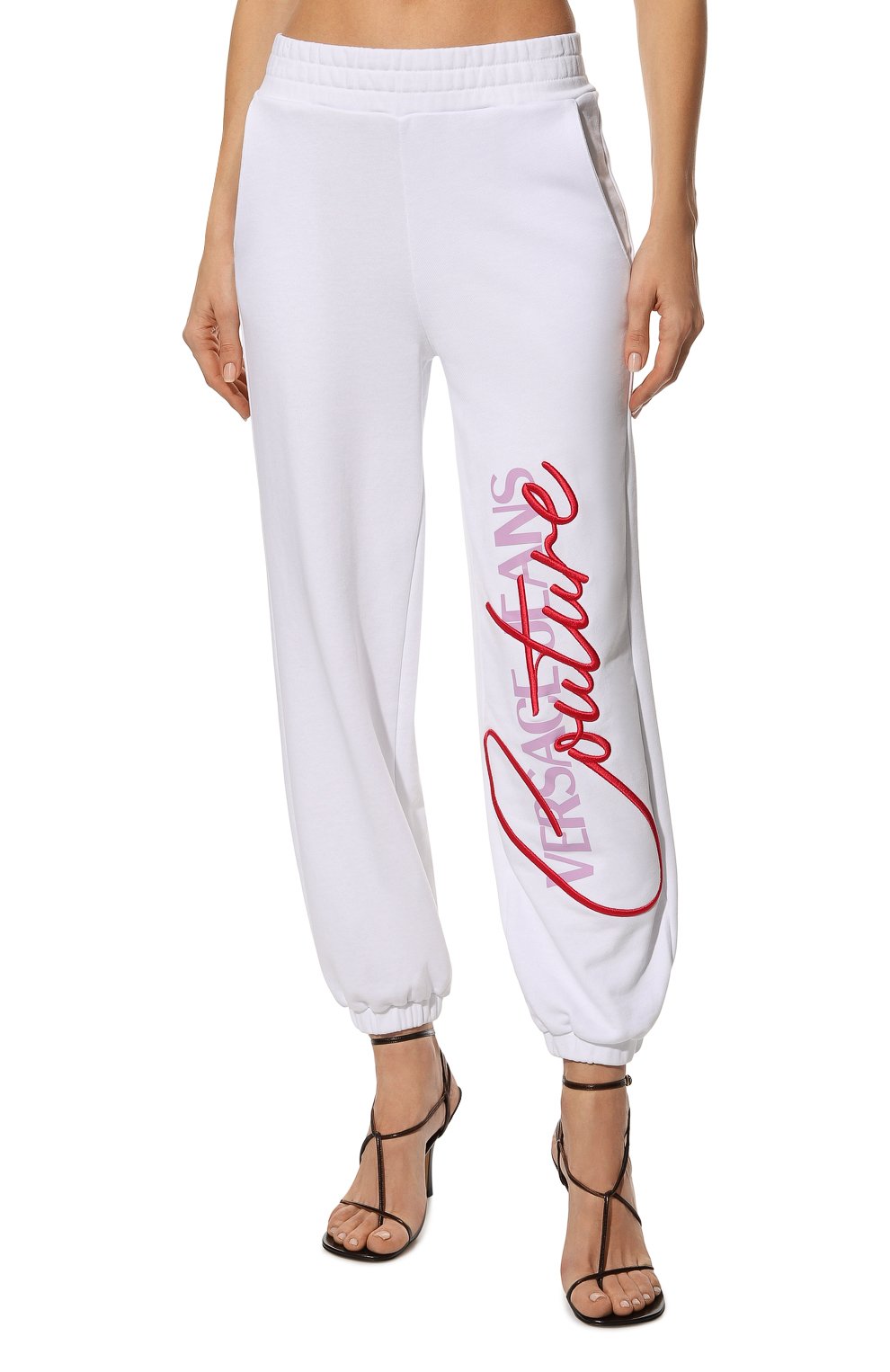 Хлопковые джоггеры VERSACE JEANS COUTURE белого цвета по цене 31700 руб., арт. 72HAAT07-72DP320 6 EMBR0 C0TT0N FLEECE WHITE/CF01T, фото 3 Хлопковые джоггеры VERSACE JEANS COUTURE, арт. 72HAAT07-72DP320 6 EMBR0 C0TT0N FLEECE WHITE/CF01T, фото 3