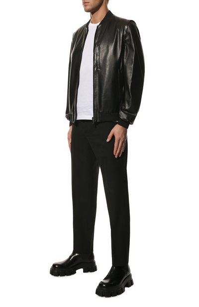 Двусторонний кожаный бомбер PRADA черного цвета по цене 465000 руб., арт. UPW368-038-F0002, фото 2 Двусторонний кожаный бомбер PRADA, арт. UPW368-038-F0002, фото 2