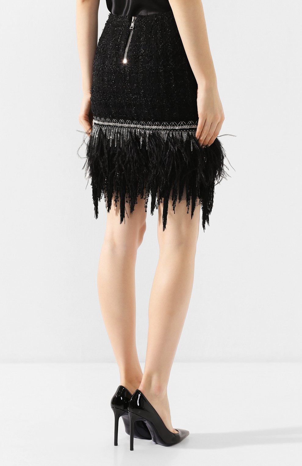 Юбка с отделкой перьями BALMAIN черного цвета по цене 166500 руб., арт. TF14000/X344, фото 4 Юбка с отделкой перьями BALMAIN, арт. TF14000/X344, фото 4