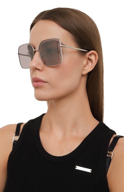 Солнцезащитные очки MIU MIU светло-розового цвета по цене 57350 руб., арт. 51YS-1BC03V, фото 2 Солнцезащитные очки MIU MIU, арт. 51YS-1BC03V, фото 2