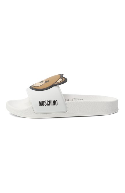 Детский шлепанцы MOSCHINO белого цвета, арт. 80632/VAR2/28-35 | Фото 2 (Материал внешний: Резина, Пластик; Нос: Не проставлено; Материал внутренний: Резина, Текстиль; Материал сплава: Проставлено)