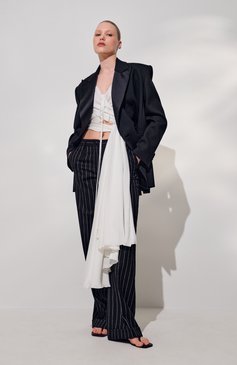 Женские шерстяные брюки DOLCE & GABBANA черного цвета, арт. FTDBVT/FR22M | Фото 7 (Материал внешний: Шерсть; Кросс-КТ: костюм; Женское Кросс-КТ: Брюки-одежда; Силуэт Ж (брюки и джинсы): Широкие; Случай: Формальный; Стили: Классический; Длина (брюки, джинсы): Стандартные; Размерность: Идёт в размер; Автоматизация ТО: Проставлено; Автоматизация состава: Проставлено)