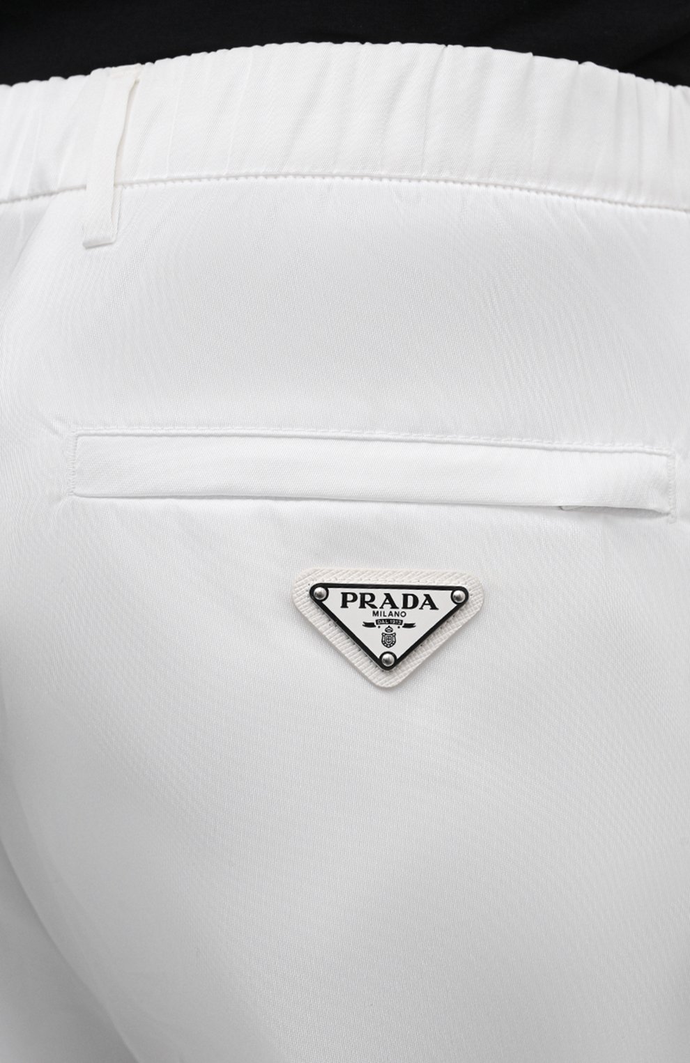 Джоггеры PRADA белого цвета по цене 125000 руб., арт. SPH109-1WQ8-F0009-211, фото 5 Джоггеры PRADA, арт. SPH109-1WQ8-F0009-211, фото 5