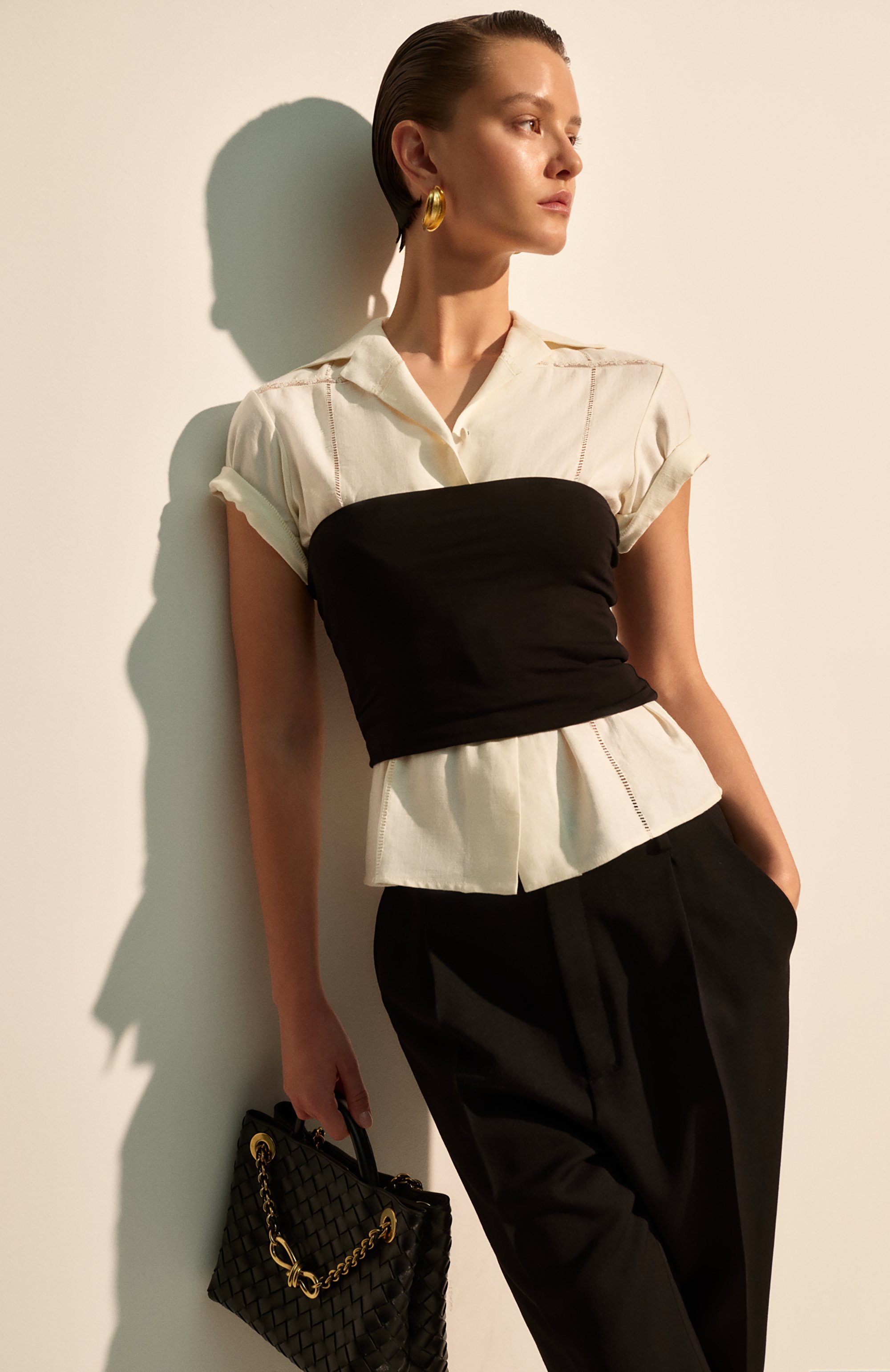 Сумка andiamo small BOTTEGA VENETA черного цвета по цене 568500 руб., арт. 766014/VCPP1, фото 8 Сумка andiamo small BOTTEGA VENETA, арт. 766014/VCPP1, фото 8