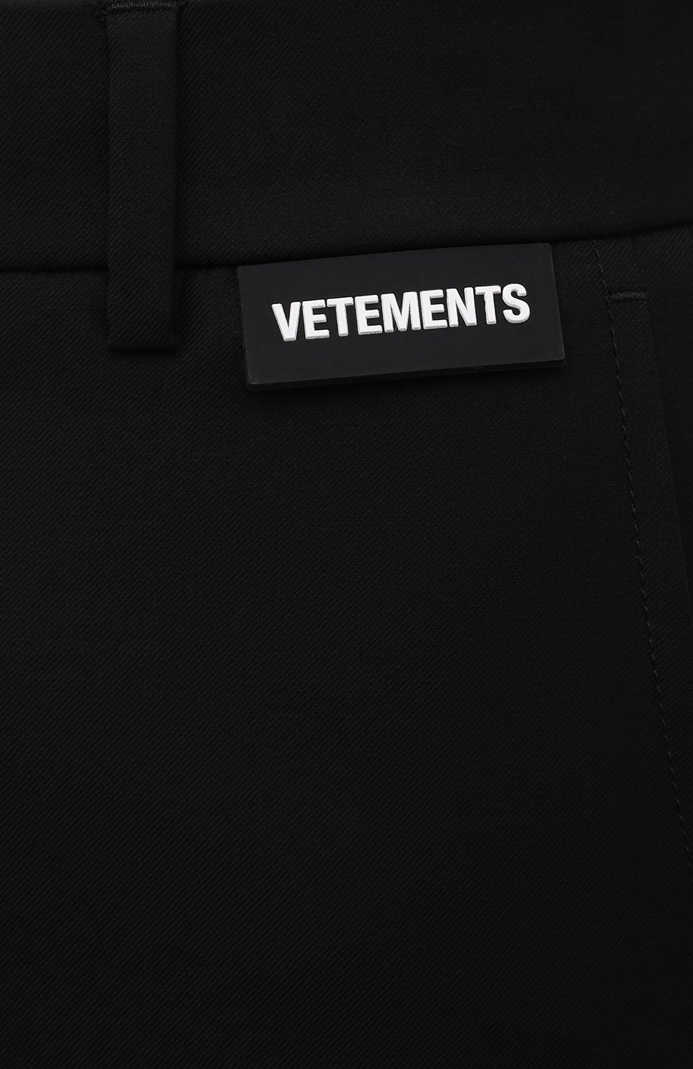 Шерстяные брюки VETEMENTS черного цвета по цене 77500 руб., арт. WA52PA500B 1202/BLACK, фото 5 Шерстяные брюки VETEMENTS, арт. WA52PA500B 1202/BLACK, фото 5
