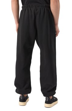 Мужские хлопковые джоггеры FEAR OF GOD черного цвета, арт. 130BT232020F-M | Фото 4 (Материал внешний: Хлопок; Длина (брюки, джинсы): Стандартные; Драгоценные камни: Проставлено; Материал сплава: Проставлено; Стили: Кэжуэл; Силуэт М (брюки): Джоггеры)