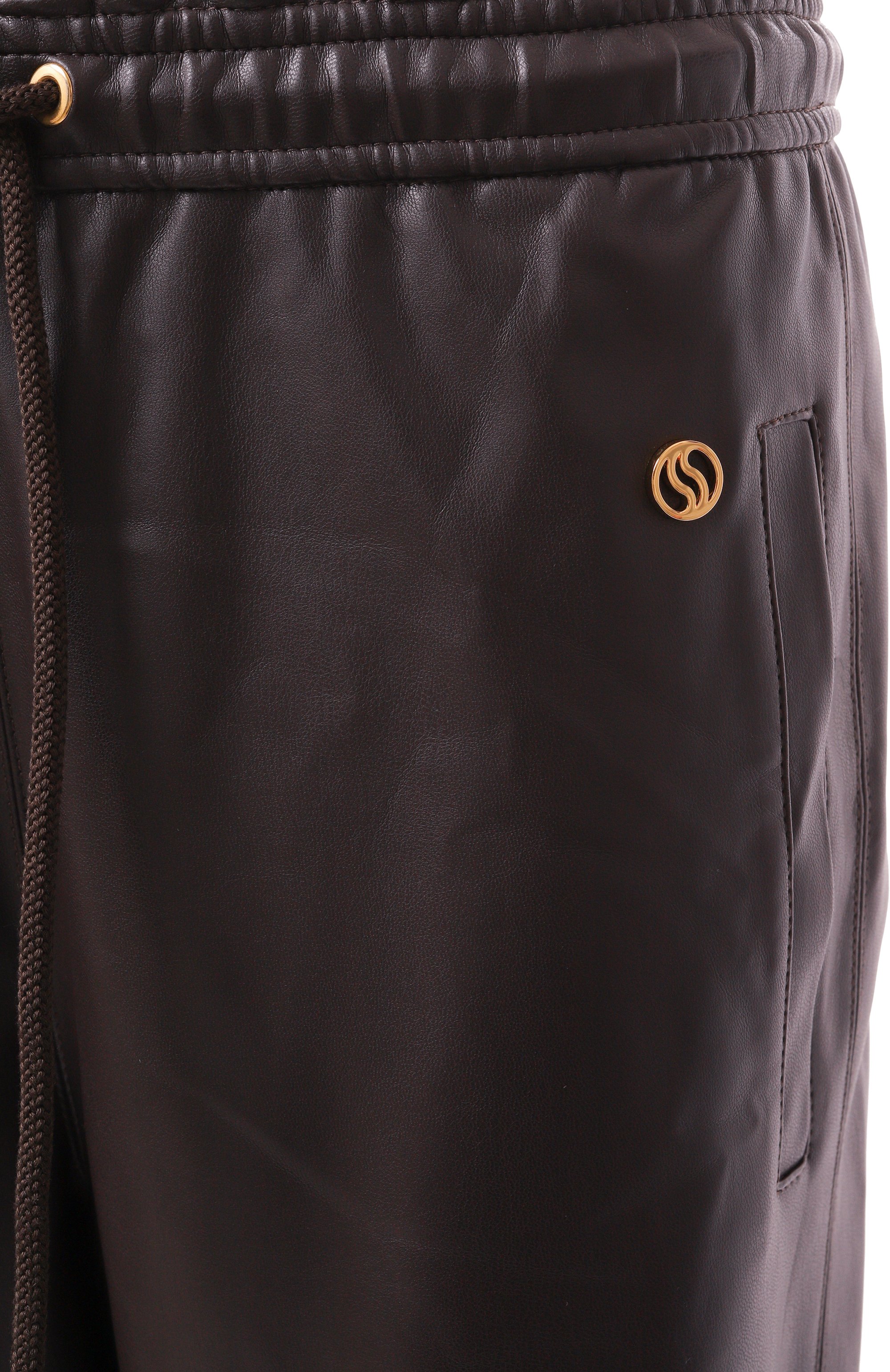 Джоггеры из экокожи STELLA MCCARTNEY коричневого цвета по цене 79150 руб., арт. 640179/3BU393, фото 6 Джоггеры из экокожи STELLA MCCARTNEY, арт. 640179/3BU393, фото 6