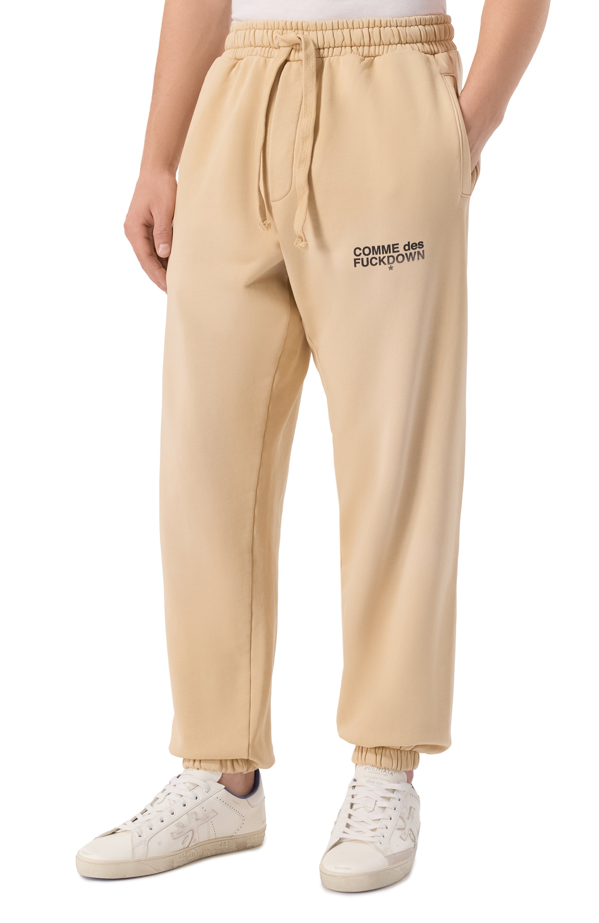 Хлопковые джоггеры COMME DES FUCKDOWN бежевого цвета по цене 14150 руб., арт. CFABM01743, фото 3 Хлопковые джоггеры COMME DES FUCKDOWN, арт. CFABM01743, фото 3