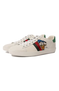 Женские кожаные кеды disney x gucci GUCCI белого цвета, арт. 649401 1XG60 | Фото 1 (Подошва: Платформа; Материал внутренний: Натуральная кожа; Материал сплава: Проставлено; Материал утеплителя: Без утеплителя; Тематический товар: Disney; Драгоценные камни: Проставлено; Стили: Кэжуэл)