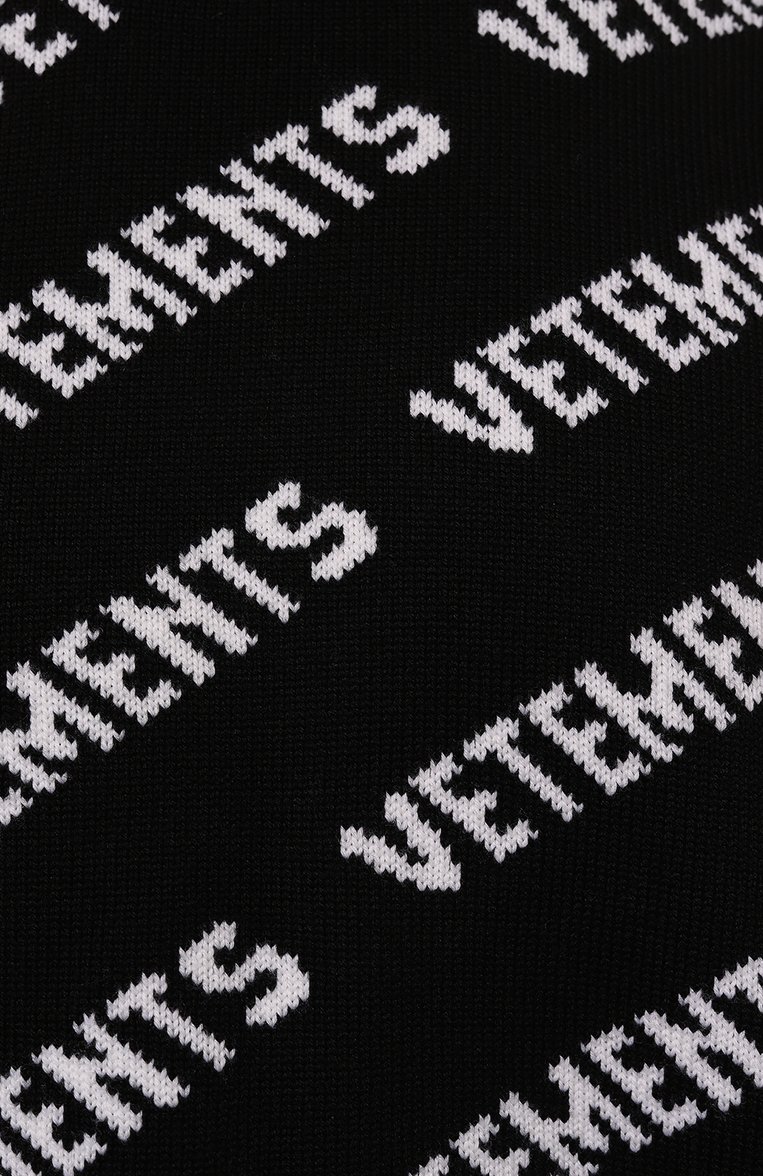 Мужского шерстяной свитер VETEMENTS черного цвета, арт. UA65KN220B/2901 KNIT | Фото 8 (Материал внешний: Шерсть; Стили: Кэжуэл; Женское Кросс-КТ: Свитер-одежда; Региональные ограничения белый список (Axapta Mercury): Не проставлено; Нос: Не проставлено; Принт: С принтом; Мужское Кросс-КТ: Свитер-одежда; Рукава: Длинные)