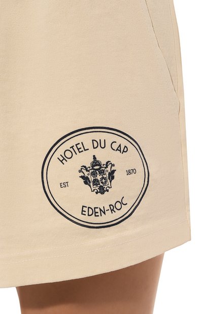 Хлопковые шорты sporty & rich х hotel du cap-eden-roc SPORTY AND RICH кремового цвета по цене 14700 руб., арт. SH037501301CR01, фото 5 Хлопковые шорты sporty & rich х hotel du cap-eden-roc SPORTY AND RICH, арт. SH037501301CR01, фото 5
