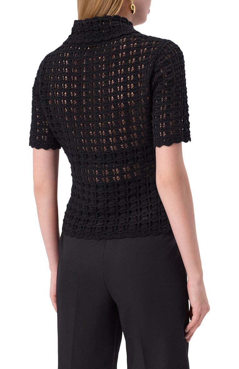 Женский шерстяное поло DOLCE & GABBANA черного цвета, арт. FXZ15T/JCVWH | Фото 4 (Рукава: Короткие; Материал внешний: Шерсть; Длина (для топов): Стандартные; Стили: Кэжуэл; Кросс-КТ: Трикотаж; Автоматизация состава: Проставлено; Автоматизация ТО: Проставлено; Размерность: Идёт в размер)
