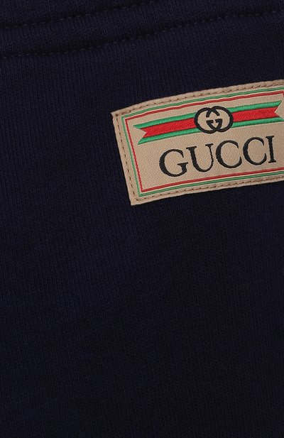 Хлопковые джоггеры GUCCI синего цвета по цене 29750 руб., арт. 653684/XJDKB, фото 3 Хлопковые джоггеры GUCCI, арт. 653684/XJDKB, фото 3