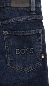 Детские джинсы BOSS темно-синего цвета, арт. J50691 | Фото 3 (Материал сплава: Проставлено; Материал внешний: Хлопок; Нос: Не проставлено; Детали: Потертости; Ростовка одежда: 7 лет | 122 см, 13 - 15 лет | 158 см, 16 лет | 164 см, 12 лет | 152 см, 9 лет | 134 см, 5 лет | 110 см)