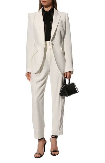 Брюки ALEXANDER MCQUEEN молочного цвета по цене 107000 руб., арт. 585278/QEAAA, фото 2 Брюки ALEXANDER MCQUEEN, арт. 585278/QEAAA, фото 2