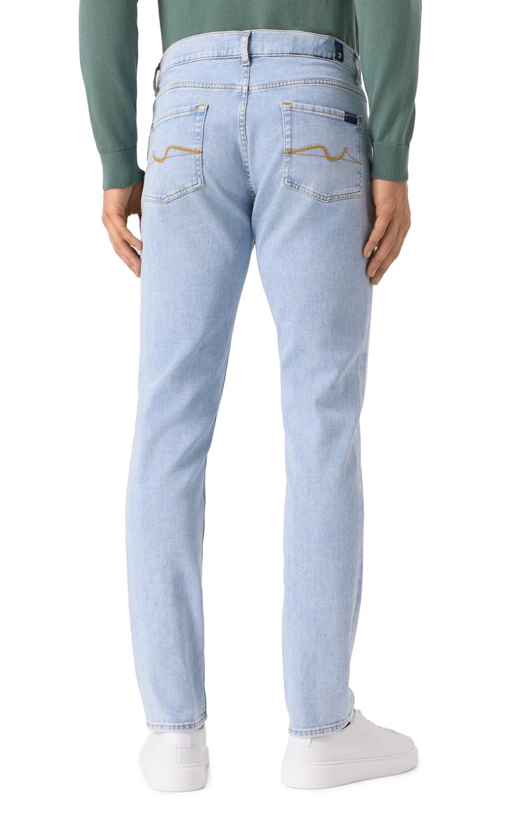 Мужские джинсы 7 FOR ALL MANKIND голубого цвета, арт. 7T042R51 | Фото 4 (Длина (брюки, джинсы): Стандартные; Материал внешний: Хлопок, Деним; Детали: Делаве; Силуэт М (брюки): Прямые; Кросс-КТ: Деним; Стили: Повседневный)