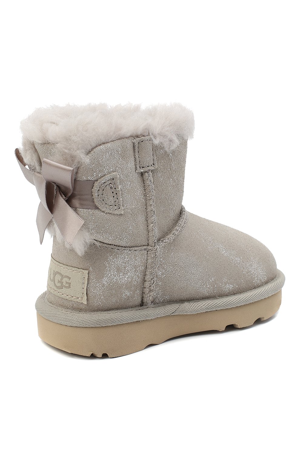Угги mini bailey bow ii shimmer UGG серебряного цвета по цене 10600 руб., арт. 1116173T_GOA, фото 3 Угги mini bailey bow ii shimmer UGG, арт. 1116173T_GOA, фото 3