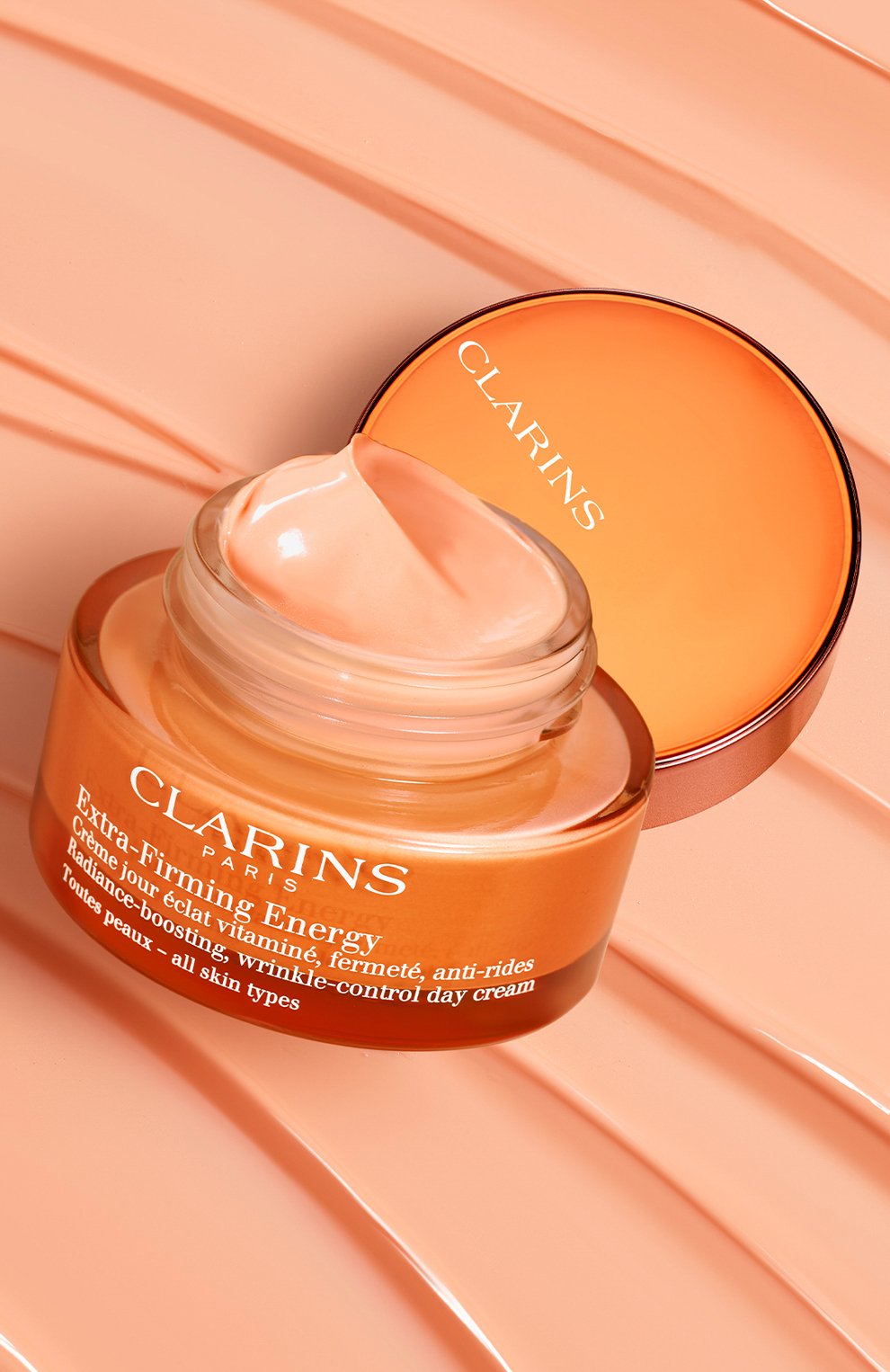 Регенерирующий дневной крем с эффектом сияния для любого типа кожи (50ml) CLARINS бесцветного цвета по цене 9700 руб., арт. 80070887, фото 2 Регенерирующий дневной крем с эффектом сияния для любого типа кожи (50ml) CLARINS, арт. 80070887, фото 2