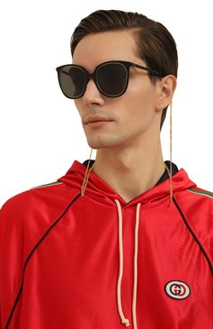 Женские солнцезащитные очки GUCCI черного цвета, арт. 691290 J0741 | Фото 4 (Кросс-КТ: С/з-унисекс; Материал: Пластик; Тип очков: С/з; Нос: Не проставлено; Региональные ограничения белый список (Axapta Mercury): Не проставлено; Оптика Гендер: оптика-унисекс; Очки форма: Круглые)