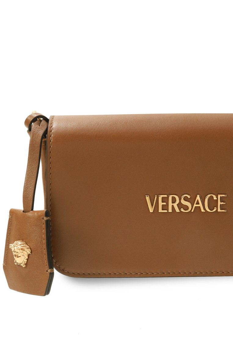 Женская сумка tag mini VERSACE коричневого цвета, арт. 1018747/1A13171 | Фото 3 (Материал: Натуральная кожа; Ремень/цепочка: На ремешке; Размер: mini; Автоматизация ТО: Проставлено; Автоматизация состава: Проставлено)