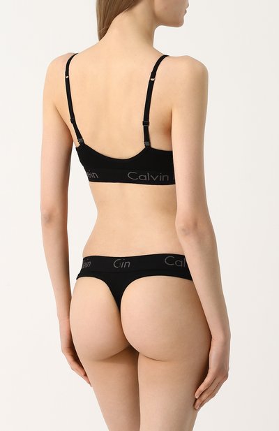 Хлопковые трусы-стринги с логотипом бренда CALVIN KLEIN черного цвета по цене 2380 руб., арт. QF4509E, фото 3 Хлопковые трусы-стринги с логотипом бренда CALVIN KLEIN, арт. QF4509E, фото 3