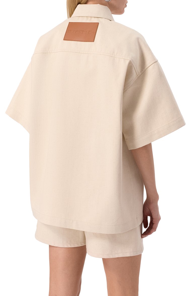 Женская джинсовая рубашка JIL SANDER бежевого цвета, арт. J40DL0166/J45285 | Фото 4 (Рукава: 3/4; Автоматизация состава: Проставлено; Автоматизация ТО: Проставлено; Материал внешний: Хлопок, Деним; Длина (для топов): Удлиненные; Женское Кросс-КТ: Рубашка-одежда; Принт: Без принта; Кросс-КТ: Деним, костюм; Стили: Минимализм)