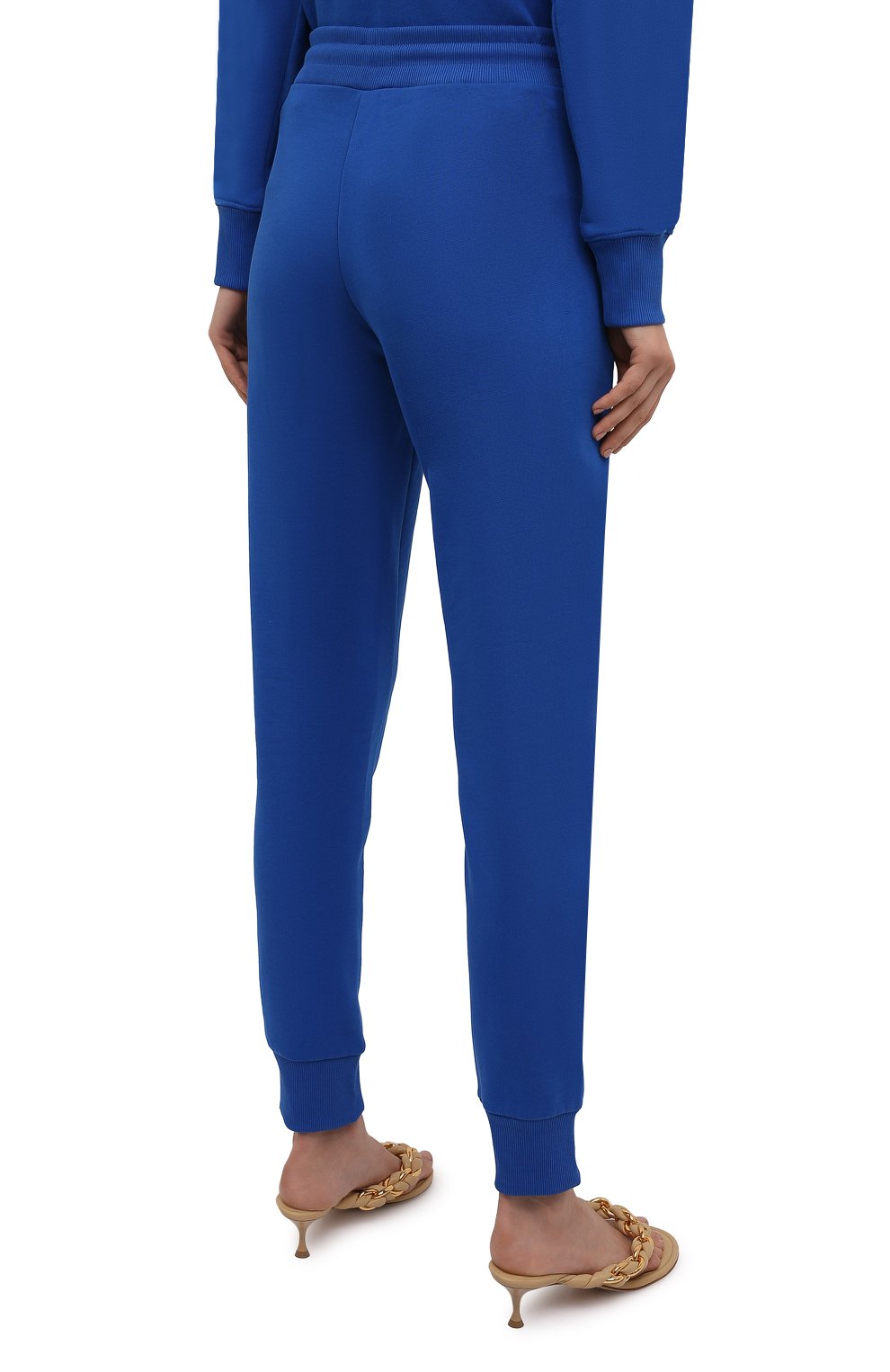 Хлопковые джоггеры VERSACE JEANS COUTURE синего цвета по цене 19300 руб., арт. 71HAAT04-71DP310 L0G0 F0IL S C0TT0N/CF00T, фото 4 Хлопковые джоггеры VERSACE JEANS COUTURE, арт. 71HAAT04-71DP310 L0G0 F0IL S C0TT0N/CF00T, фото 4