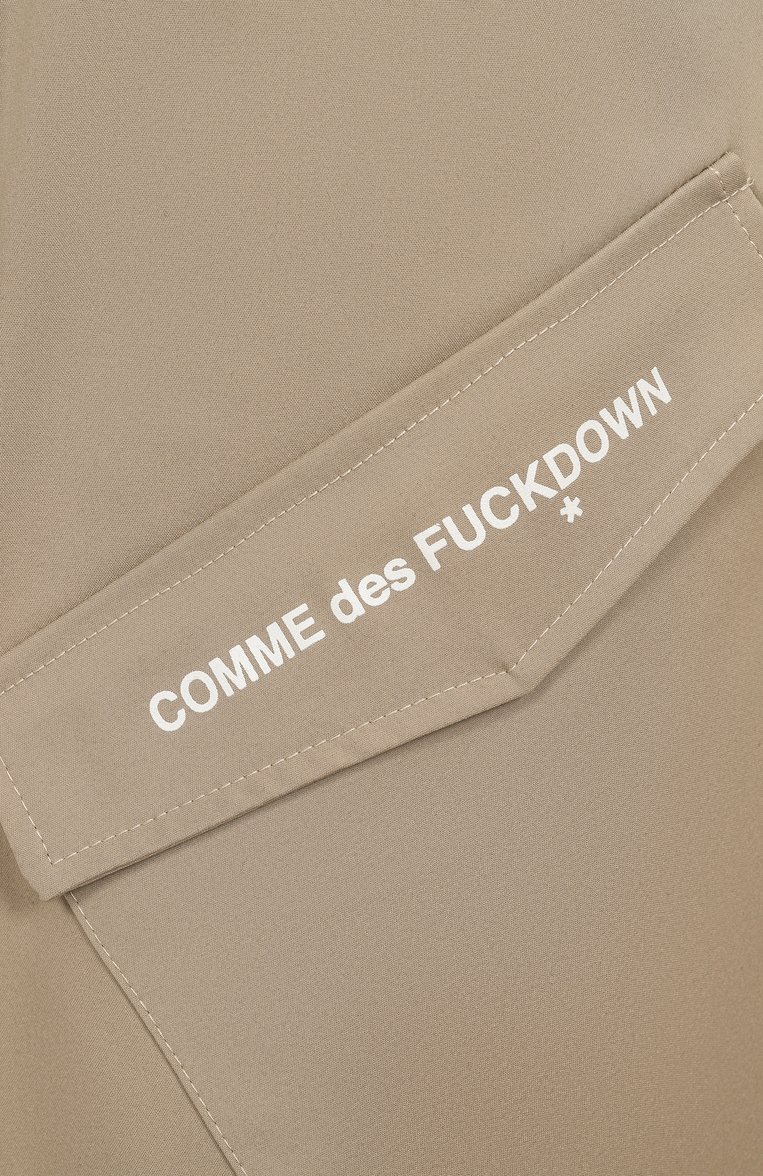 Мужские шорты COMME DES FUCKDOWN бежевого цвета, арт. CFABM01636 | Фото 6 (Материал внешний: Хлопок, Синтетический материал; Длина Шорты М: Ниже колена; Принт: С принтом; Случай: Повседневный; Стили: Спорт-шик)