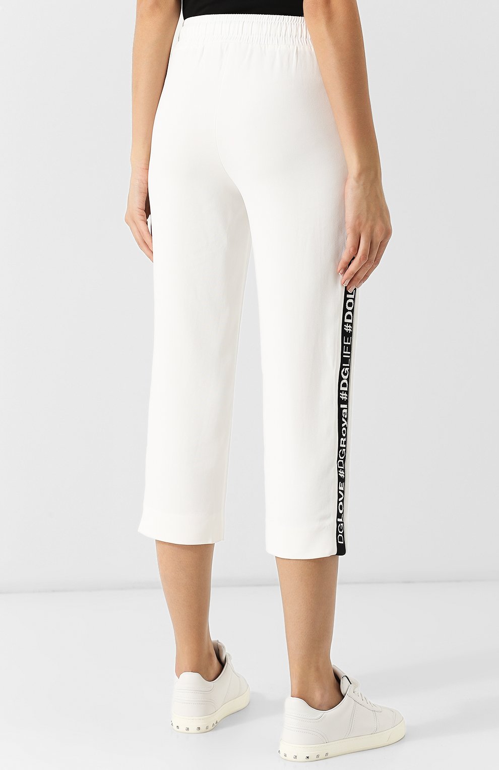 Укороченные брюки с контрастными лампасами DOLCE & GABBANA белого цвета по цене 79950 руб., арт. FTA66T/G70MP, фото 4 Укороченные брюки с контрастными лампасами DOLCE & GABBANA, арт. FTA66T/G70MP, фото 4