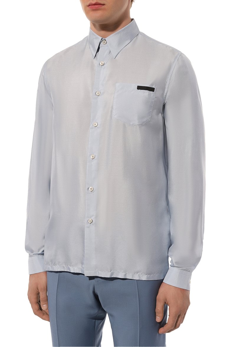 Мужская шелковая рубашка PRADA голубого цвета, арт. UCN123-1W5X-F0012-192 | Фото 3 (Рукава: Длинные; Длина (для топов): Стандартные; Материал внешний: Шелк; Рубашки М: Classic Fit; Случай: Повседневный; Стили: Кэжуэл; Манжеты: На пуговицах; Принт: Однотонные; Воротник: Кент; Детали: Без декора; Автоматизация ТО: Проставлено; Автоматизация состава: Проставлено)