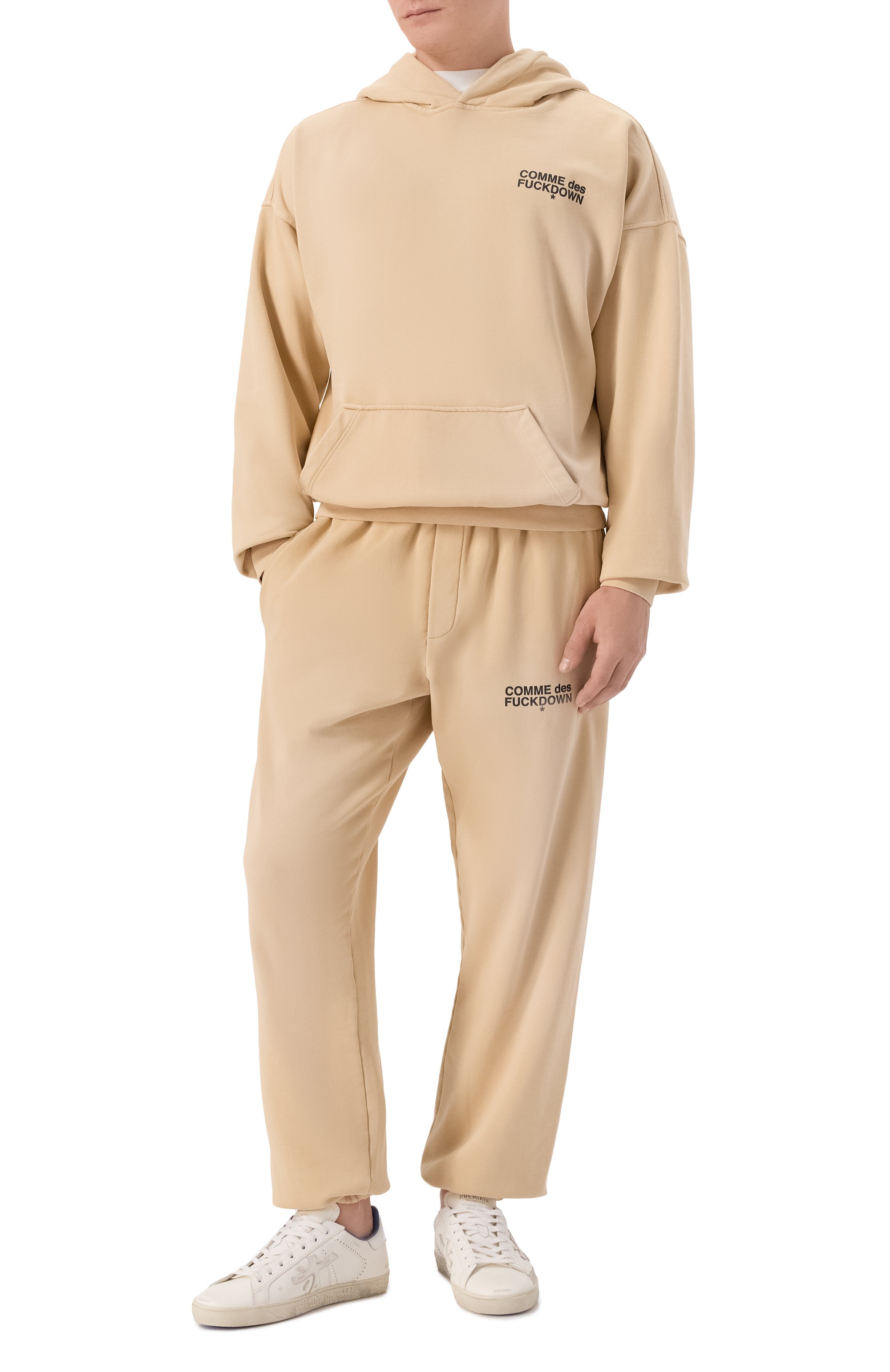 Хлопковые джоггеры COMME DES FUCKDOWN бежевого цвета по цене 14150 руб., арт. CFABM01743, фото 2 Хлопковые джоггеры COMME DES FUCKDOWN, арт. CFABM01743, фото 2