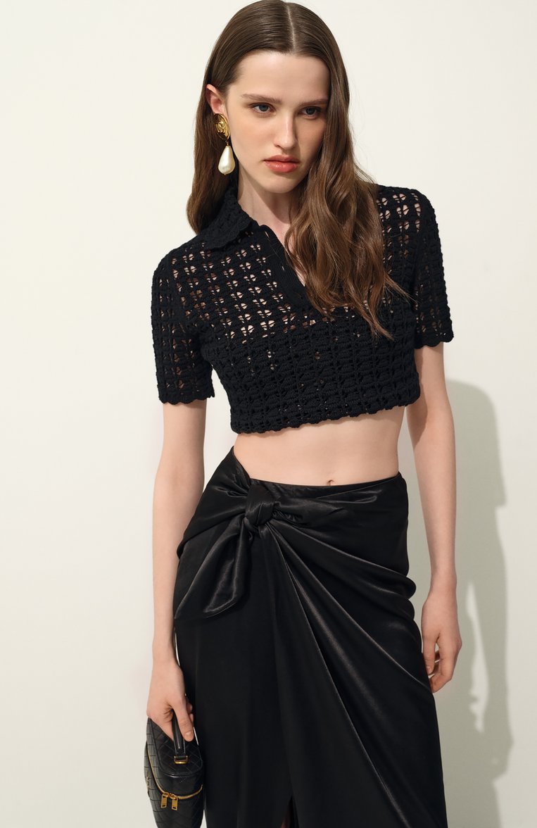 Женский шерстяное поло DOLCE & GABBANA черного цвета, арт. FXZ15T/JCVWH | Фото 7 (Рукава: Короткие; Материал внешний: Шерсть; Длина (для топов): Стандартные; Стили: Кэжуэл; Кросс-КТ: Трикотаж; Автоматизация состава: Проставлено; Автоматизация ТО: Проставлено; Размерность: Идёт в размер)