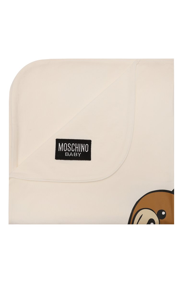 Детского хлопковое одеяло MOSCHINO кремового цвета, арт. M6B005/LCA19 | Фото 1 (Материал: Текстиль, Хлопок; Нос: Не проставлено)