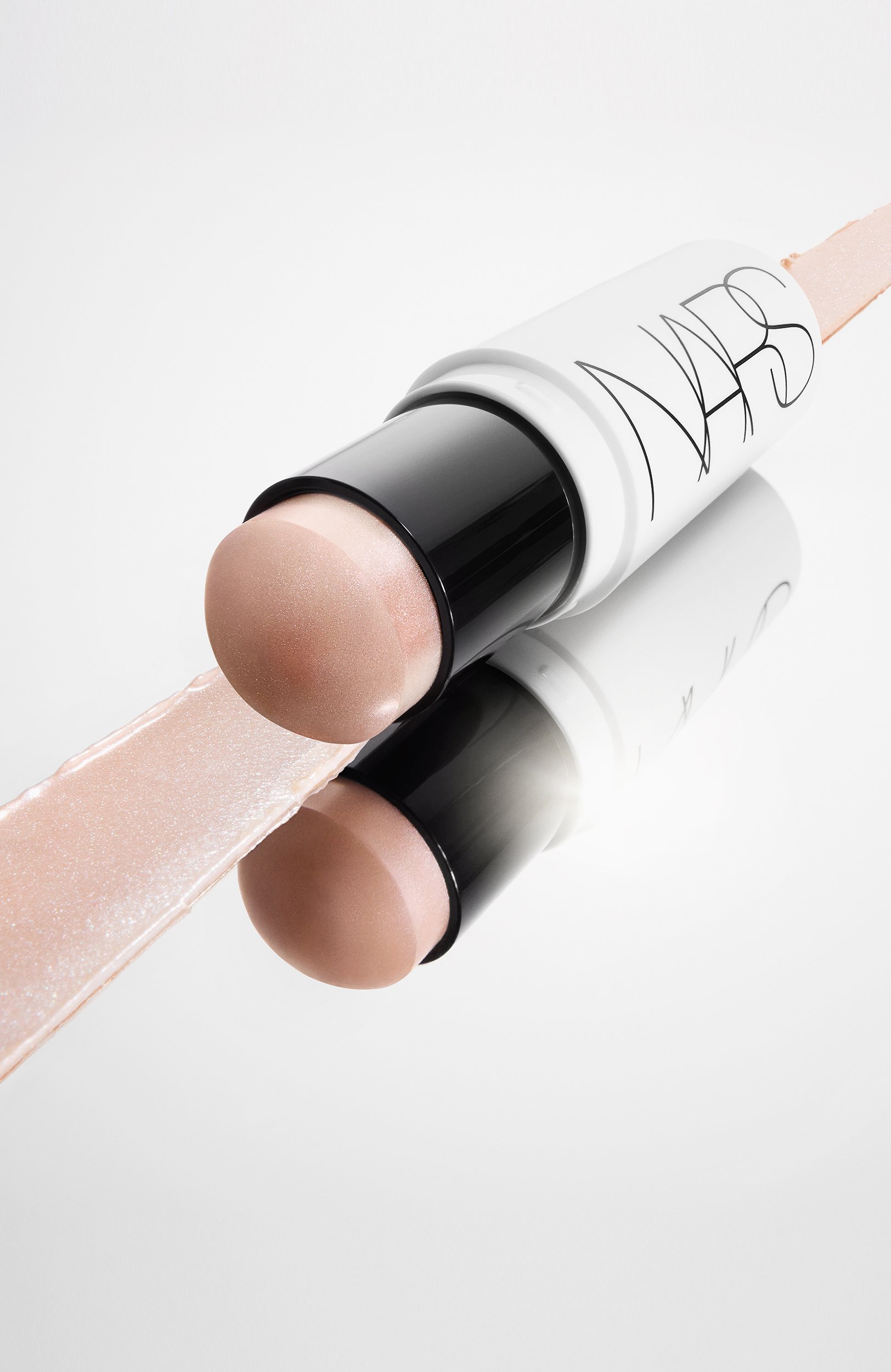 Люминайзер light reflecting luminizing stick, оттенок heavenly (7g) NARS цвета по цене 6600 руб., арт. 34504233NS, фото 6 Люминайзер light reflecting luminizing stick, оттенок heavenly (7g) NARS, арт. 34504233NS, фото 6
