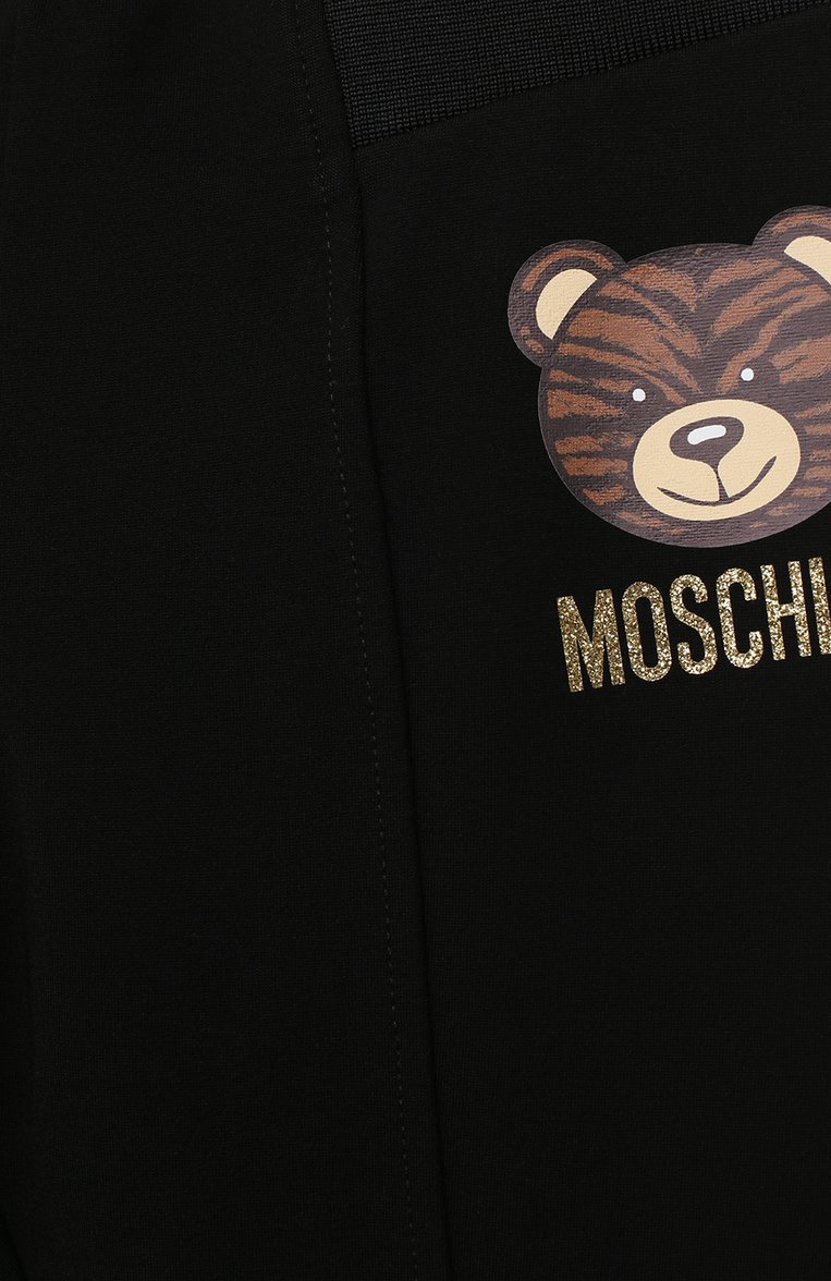Детские брюки со штрипками MOSCHINO черного цвета, арт. HDP03T/LJA02/4A-8A | Фото 3 (Девочки Кросс-КТ: Брюки-одежда; Материал внешний: Вискоза; Нос: Не проставлено; Ростовка одежда: 4 года | 104 см, 5 лет | 110 см, 6 лет | 116 см, 8 лет | 128 см)