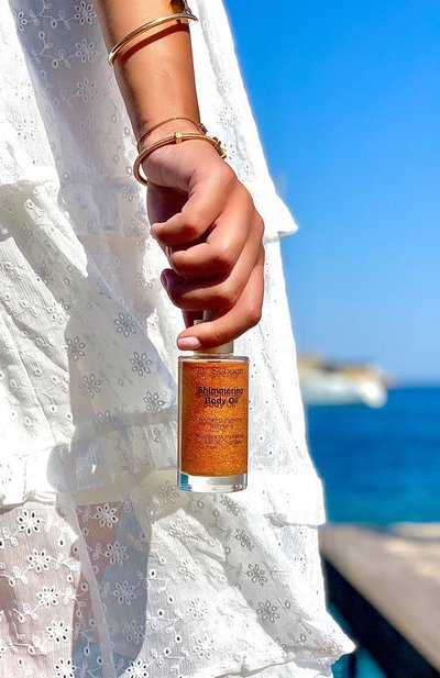 Мерцающее увлажняющее масло shimmering body oil (50ml) DR SEBAGH бесцветного цвета по цене 12770 руб., арт. 2298, фото 3 Мерцающее увлажняющее масло shimmering body oil (50ml) DR SEBAGH, арт. 2298, фото 3